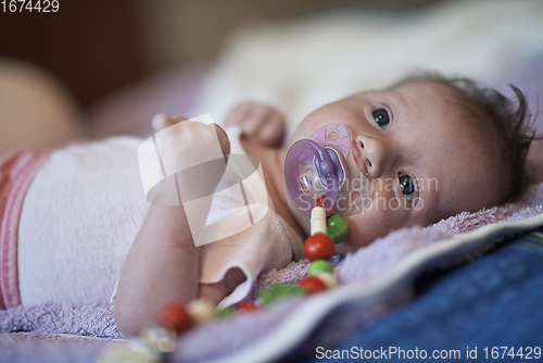 Image of happy newborn little baby smilling