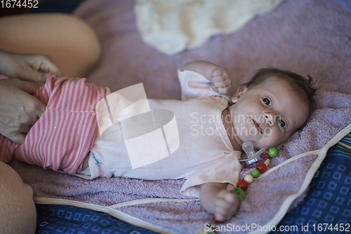 Image of happy newborn little baby smilling