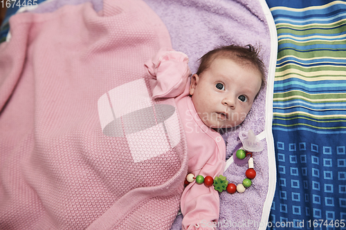 Image of happy newborn little baby smilling