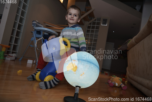 Image of Little boy child playing with creative toys