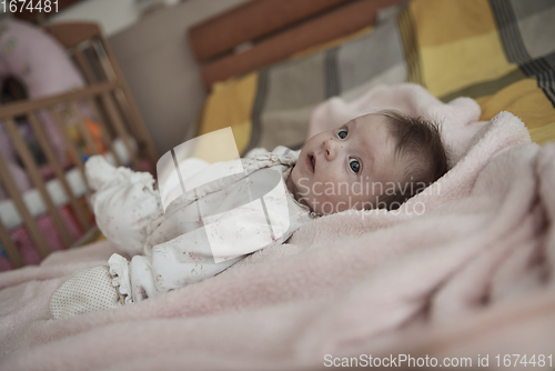 Image of happy newborn little baby smilling