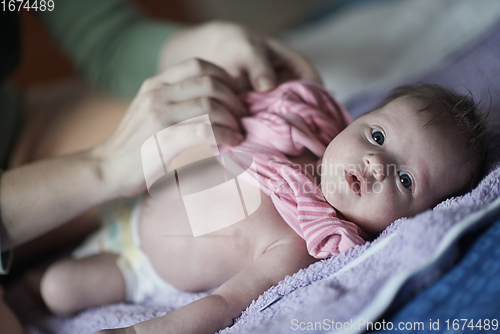 Image of happy newborn little baby smilling