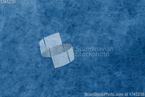 Image of concrete wall painterd in classic blue color