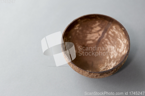 Image of close up of coconut bowl on table