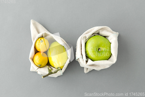 Image of fruits in reusable canvas bags for food shopping