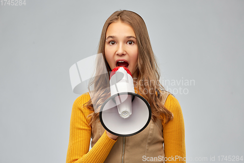 Image of teenage girl speaking to megaphone