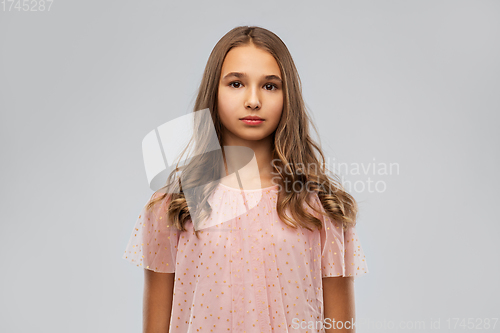 Image of young teenage girl in party dress