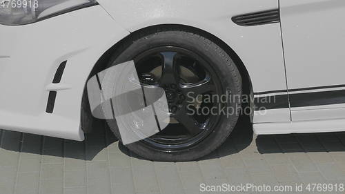 Image of BARNAUL - AUGUST 22: Day of the city. Car wheel on the car of white color on August 22, 2017 in Barnaul, Russia