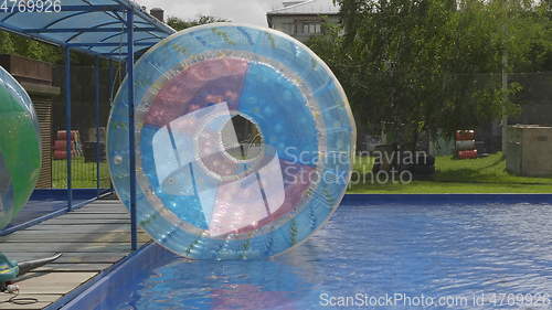 Image of Plastic zorbing ball on the lake water