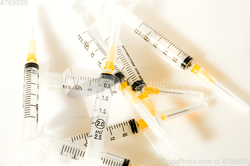Image of Syringes on white background