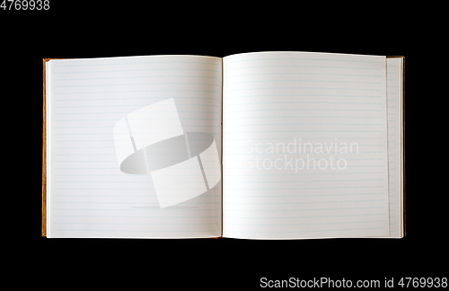 Image of Open blank notebook isolated on black