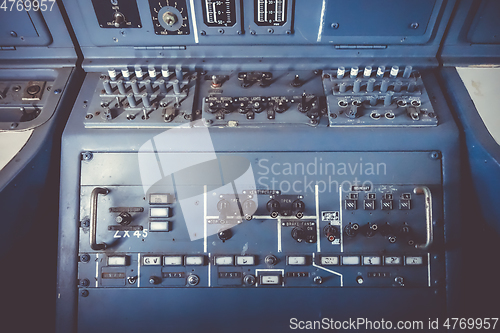 Image of Old airplane control panel in cockpit