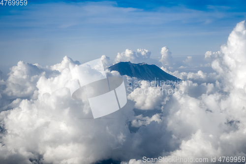 Image of Airplane flying above Mount Agung volcano, Bali, Indonesia