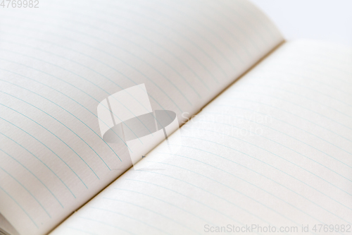 Image of Open blank notebook closeup view