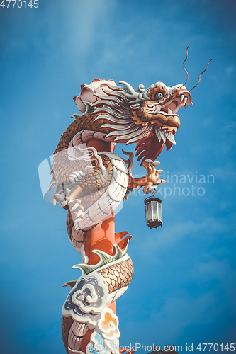 Image of Dragon statue in Wat Phanan Choeng, Ayutthaya, Thailand