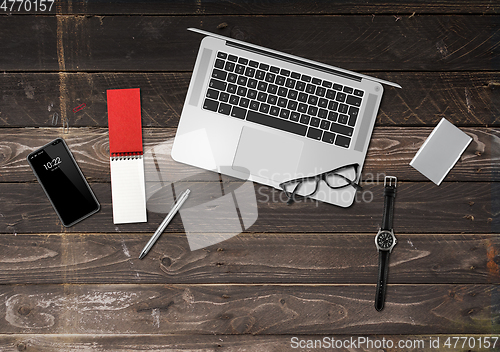 Image of Wooden office desk mockup top view