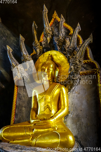 Image of Buddha in Wat Suwan Kuha temple, Thailand