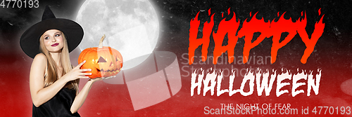 Image of Young woman in hat as a witch on scary red background