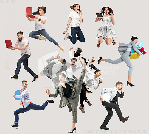 Image of Office workers or ballet dancers jumping on white background