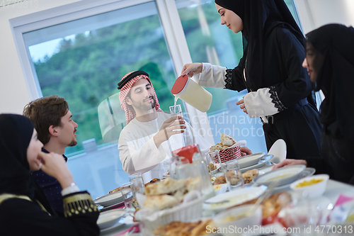 Image of Muslim family having iftar together during Ramadan