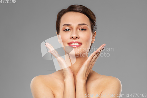 Image of beautiful young woman with bare shoulder