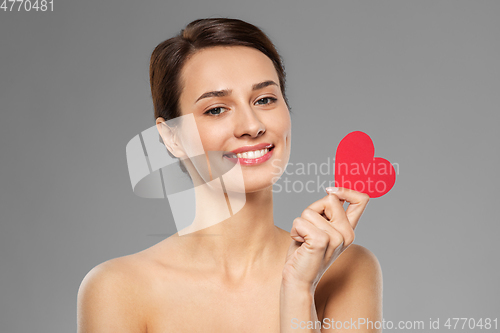 Image of beautiful woman with pink heart shape