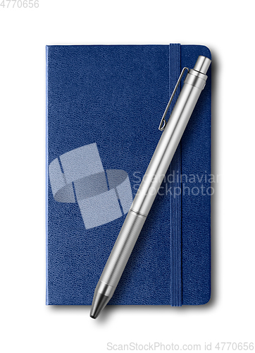 Image of Marine blue closed notebook and pen isolated on white