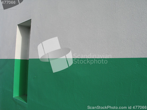 Image of door on a white and green building