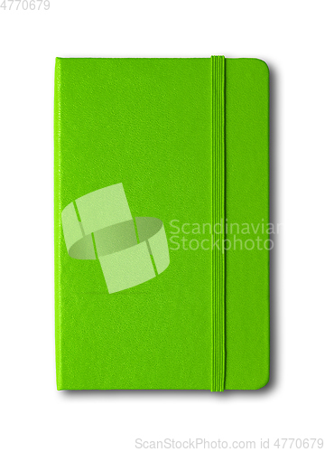 Image of Green closed notebook isolated on white