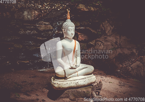 Image of Buddha statue in jungle, Wat Palad, Chiang Mai, Thailand