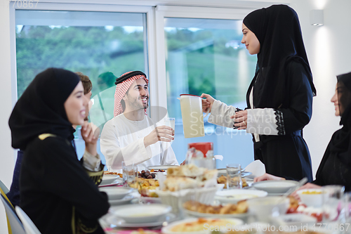 Image of Muslim family having iftar together during Ramadan