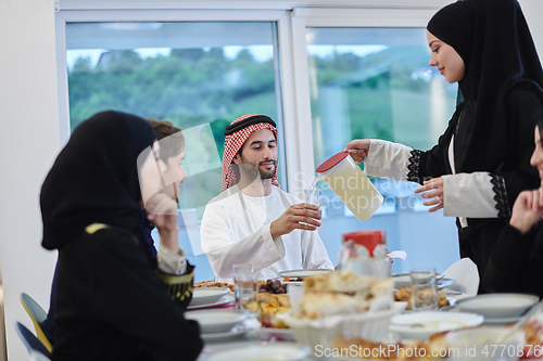 Image of Muslim family having iftar together during Ramadan