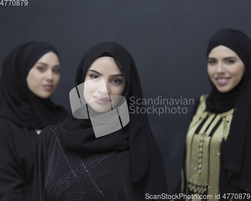 Image of Portrait of Arab women wearing traditional clothes or abaya