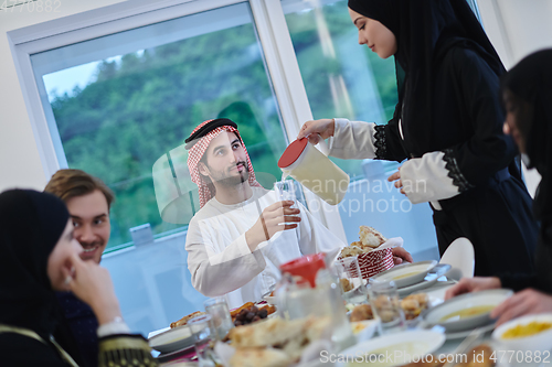 Image of Muslim family having iftar together during Ramadan