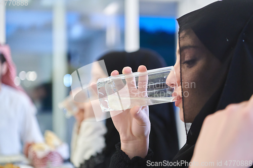 Image of Muslim family having iftar together during Ramadan