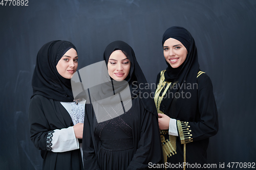 Image of Portrait of Arab women wearing traditional clothes or abaya