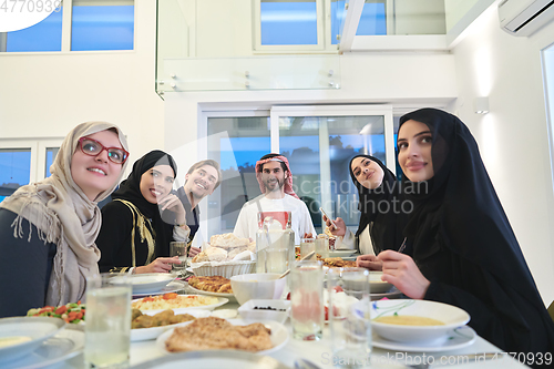 Image of Muslim family having iftar together during Ramadan.