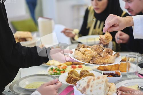 Image of Muslim family having iftar together during Ramadan