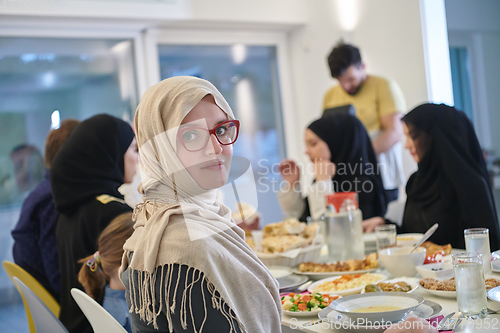 Image of Muslim family having iftar together during Ramadan.