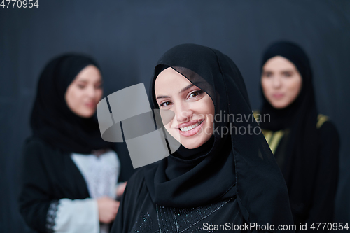 Image of Portrait of Arab women wearing traditional clothes or abaya