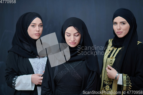 Image of Portrait of Arab women wearing traditional clothes or abaya