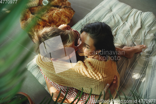 Image of Couple of lovers at home relaxing together, comfortable