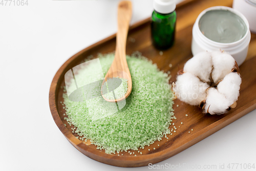 Image of bath salt, serum, clay mask and cotton on tray