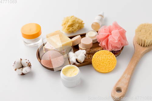 Image of crafted soap, sponges, brush and natural cosmetics