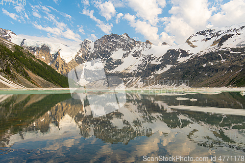 Image of Reflection at Lake of the Hanging Glacier
