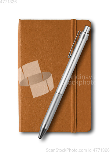 Image of Leather closed notebook and pen isolated on white