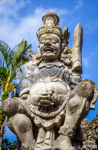 Image of Gard statue on a temple entrance door, Ubud, Bali, Indonesia