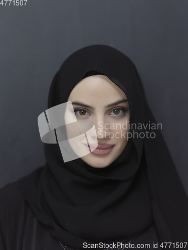 Image of Portrait of young muslim woman wearing hijab