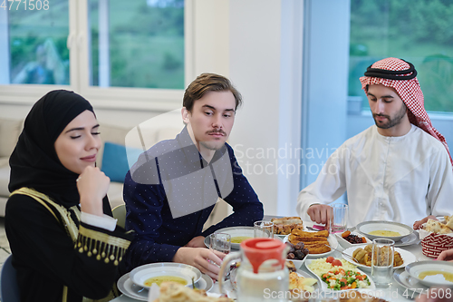 Image of Muslim family having iftar together during Ramadan