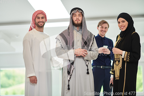 Image of Group portrait of muslim businessmen and businesswoman